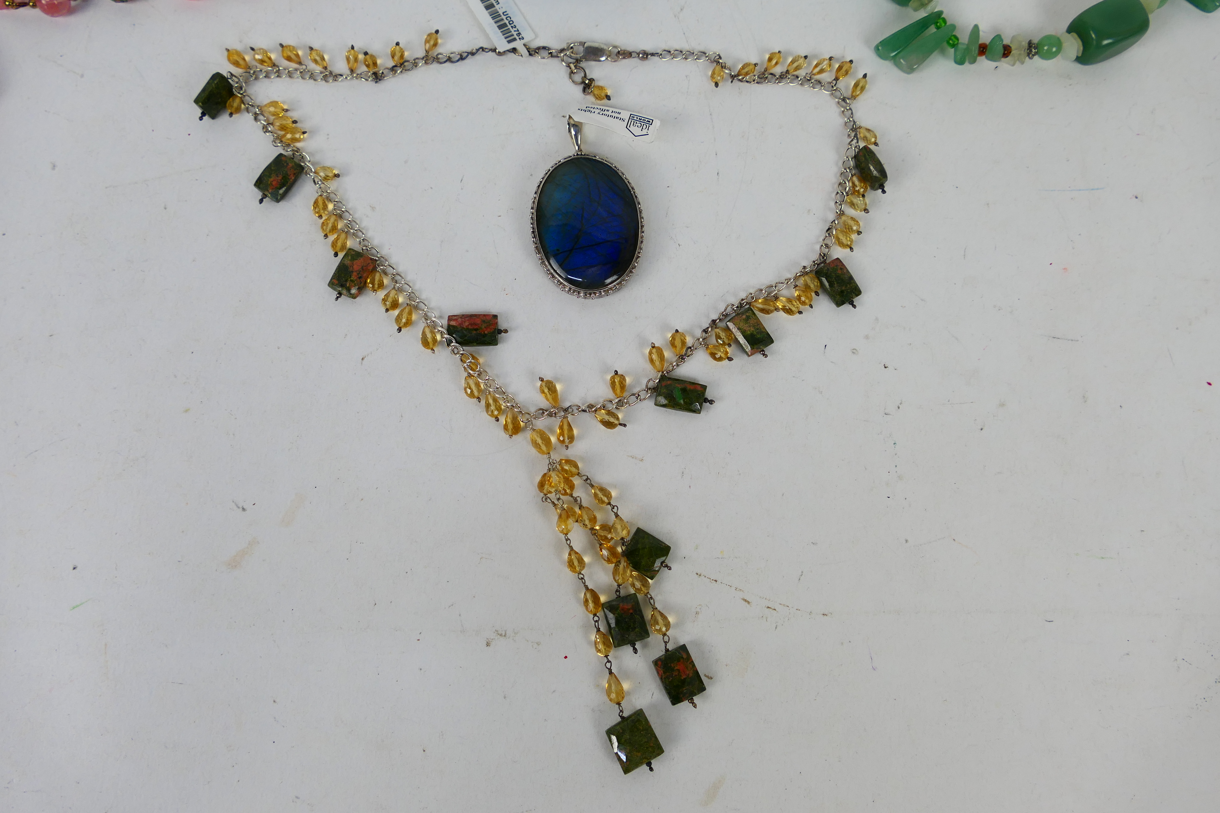 A group of modern semi-precious stone set necklaces including unused examples still with tags and a - Image 4 of 4