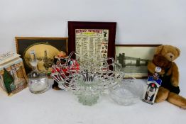 Lot to include a decorative glass centrepiece, boxed Dartington Crystal decanter, framed prints,