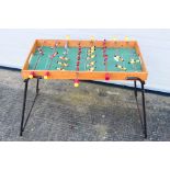 A vintage table football game.