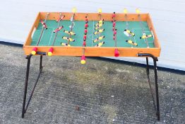 A vintage table football game.