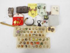 A mixed lot to include earrings, bracelets,