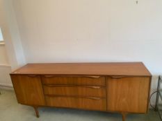 A Sutcliffe of Todmorden sideboard credenza, three central drawers flanked by cupboards,