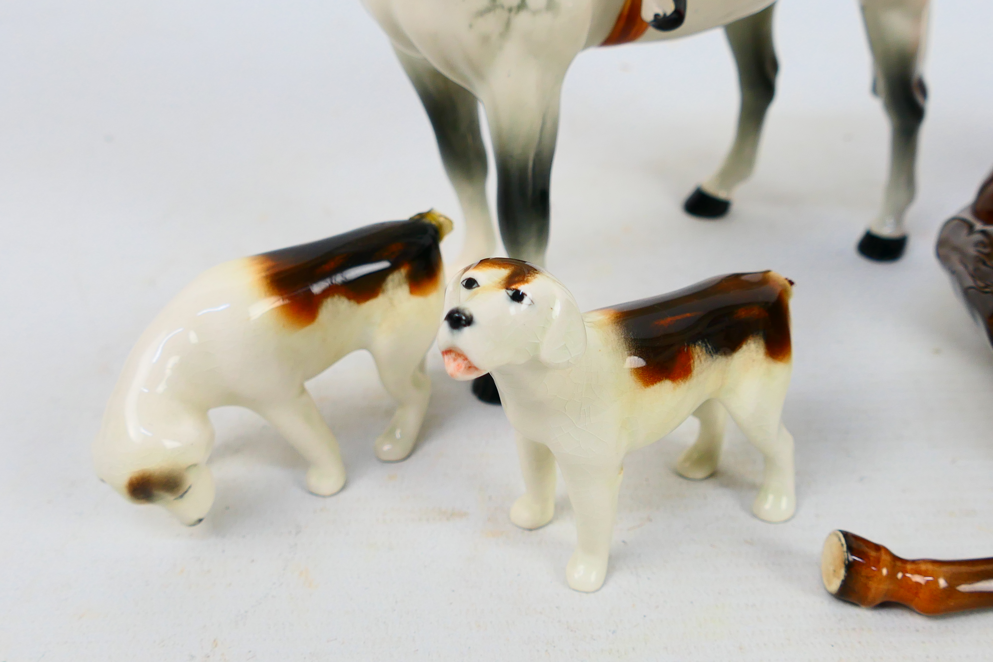 Four Beswick hunting figures comprising huntsman on brown horse and huntswoman on grey, - Image 3 of 10