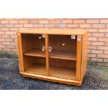 Ercol - A Windsor twin door display cabinet or glazed bookcase, approximately 68 cm x 92 cm x 44 cm.