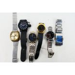 A collection of wrist watches to include a Seiko 5 automatic, 6119-7103, Seiko SQ100 quartz,