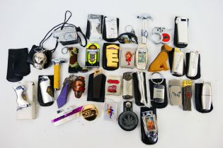 A collection of novelty cigarette lighters and protective cases.
