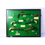 A framed display of reproduction early f