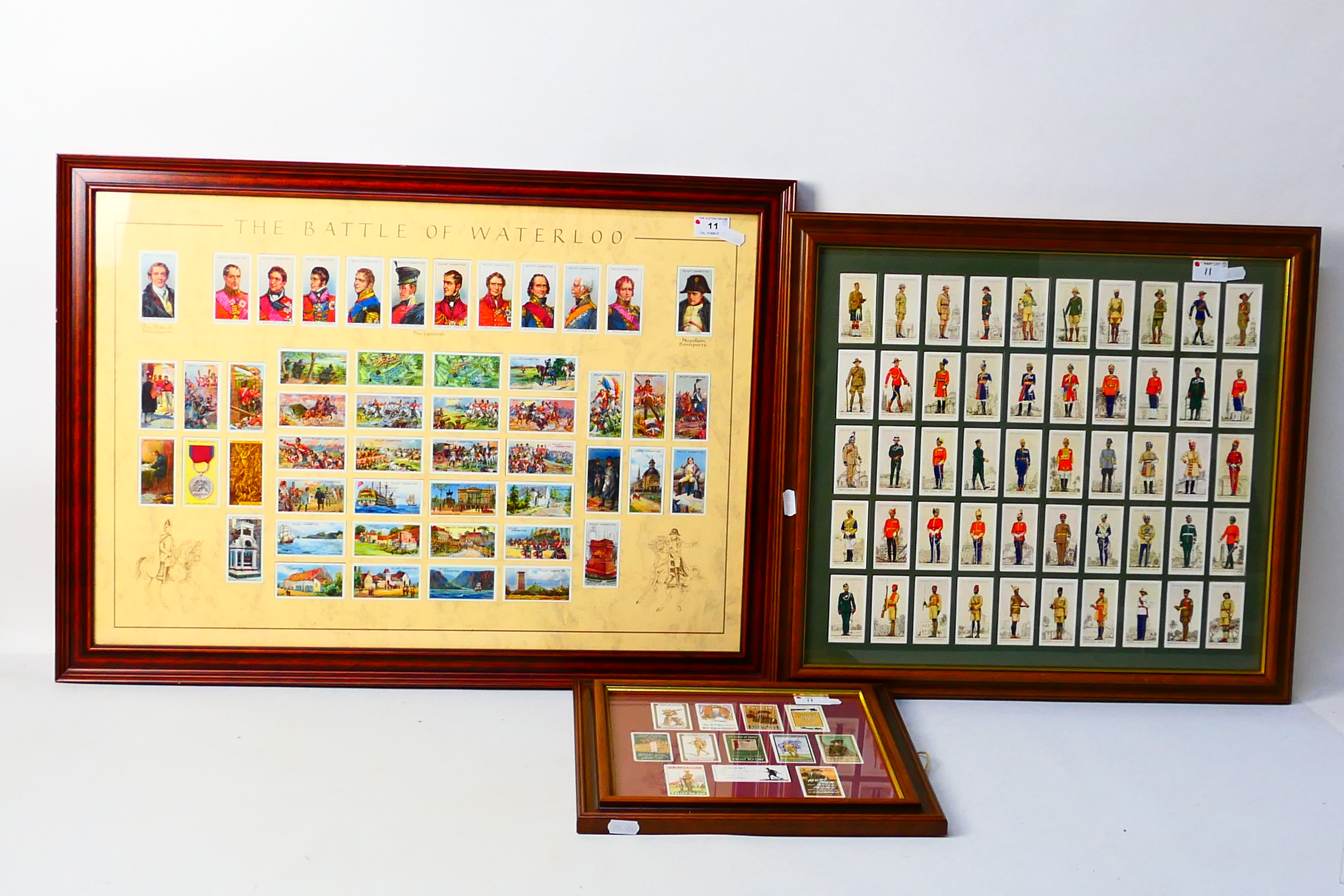 Three framed cigarette card displays com