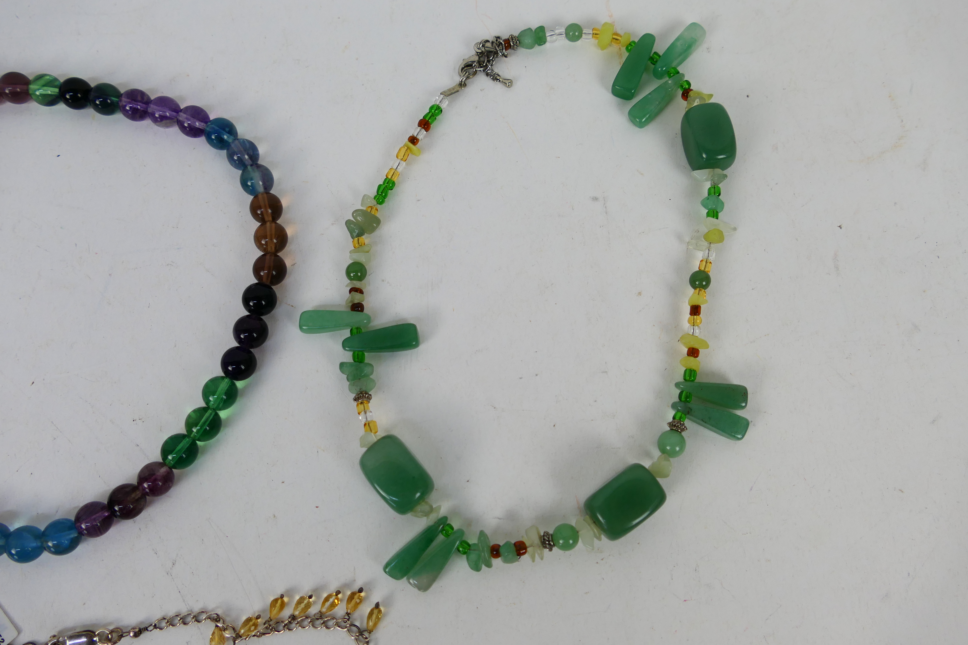 A group of modern semi-precious stone set necklaces including unused examples still with tags and a - Image 3 of 4