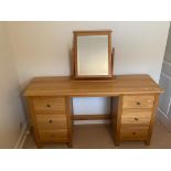 A Corndell Furniture Co dressing table with swing mirror and three drawers to each side,