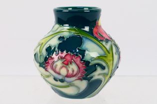 Moorcroft - A small Moorcroft Pottery vase of globular form,