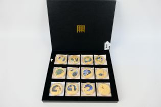 A Westminster Mint cased set of twelve limited edition coins from the Myths And Legends Of Great