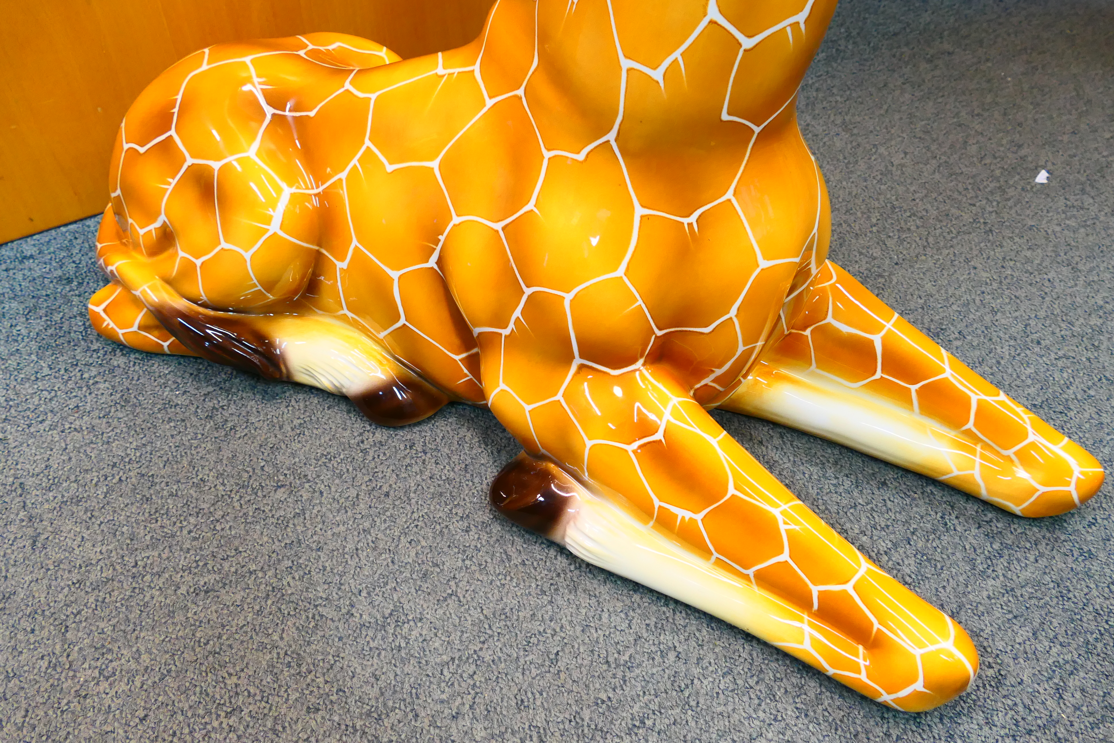 A large Italian ceramic study of a recumbent giraffe, approximately 90 cm (h). - Image 11 of 12