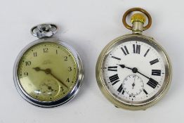 A white metal cased open face pocket watch with Roman numerals to a white enamel dial,