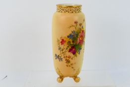 Royal Worcester - a blush ivory cylindrical vase with pierced neck, decorated with pink blossom,