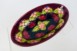 Moorcroft - A Moorcroft Collectors Club bowl of oval form, decorated in the Morello pattern,