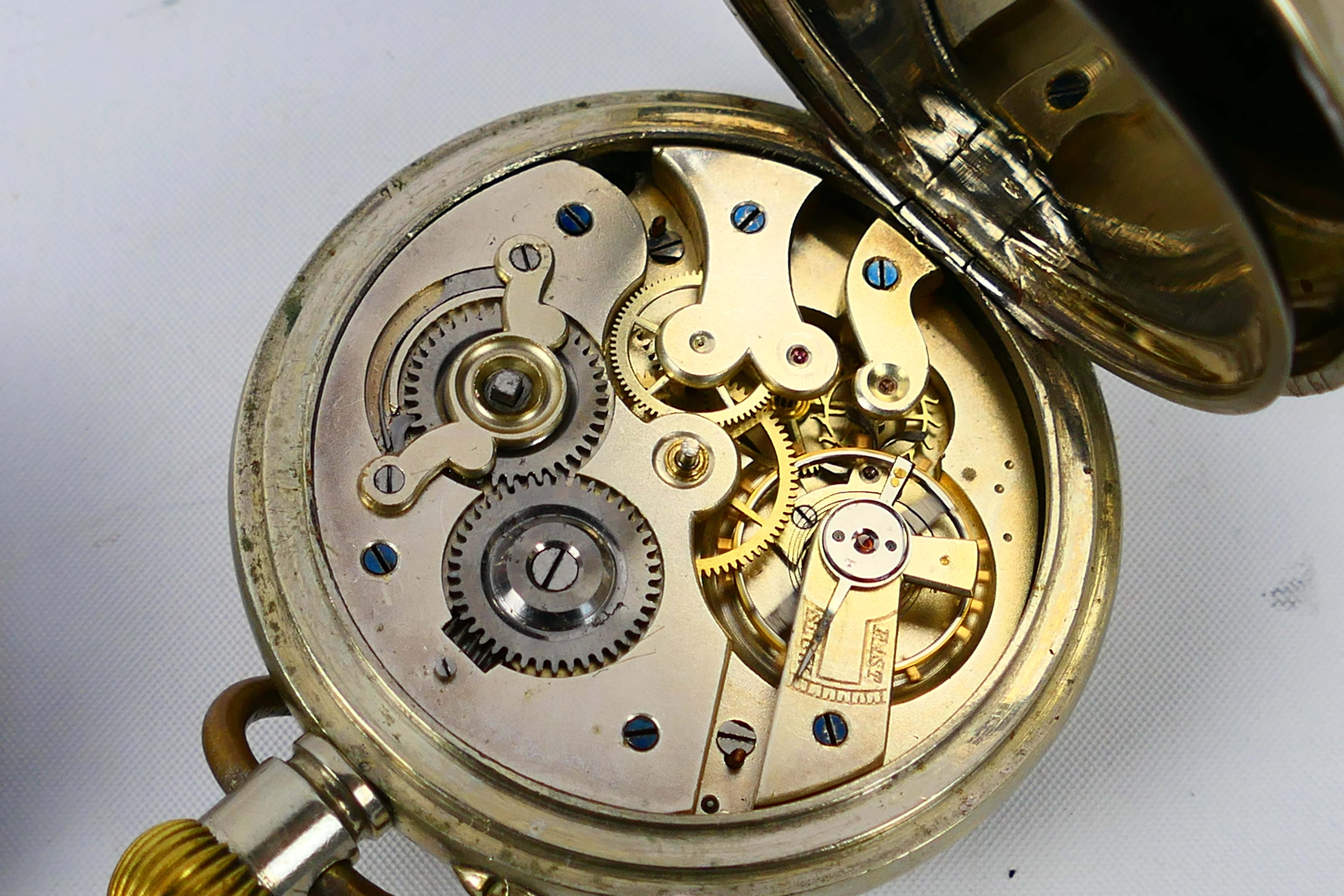 A white metal cased open face pocket watch with Roman numerals to a white enamel dial, - Image 6 of 7