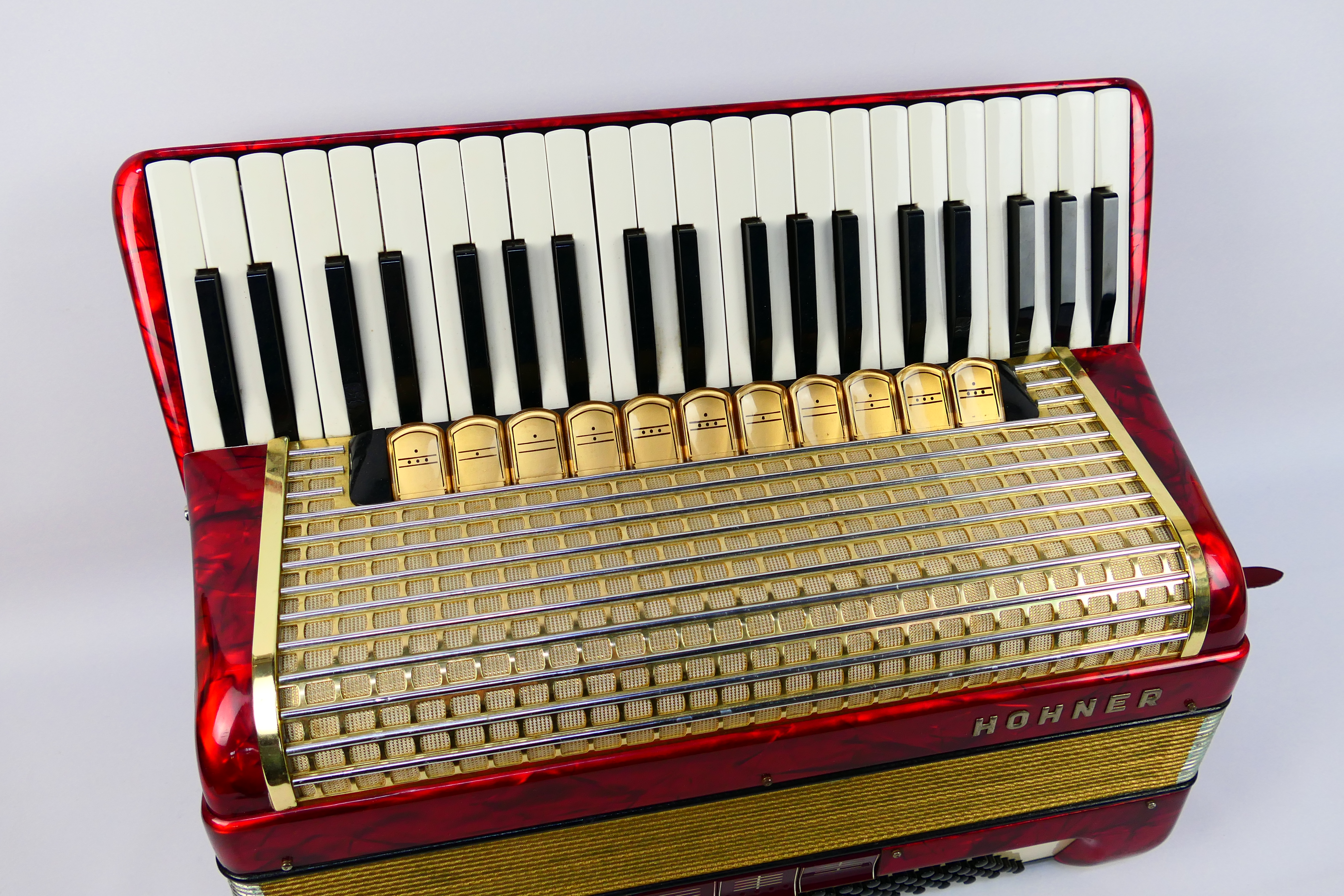 A vintage Hohner Verdi VM piano accordion, 41 keys and 120 basses, marbled red finish, - Image 2 of 18