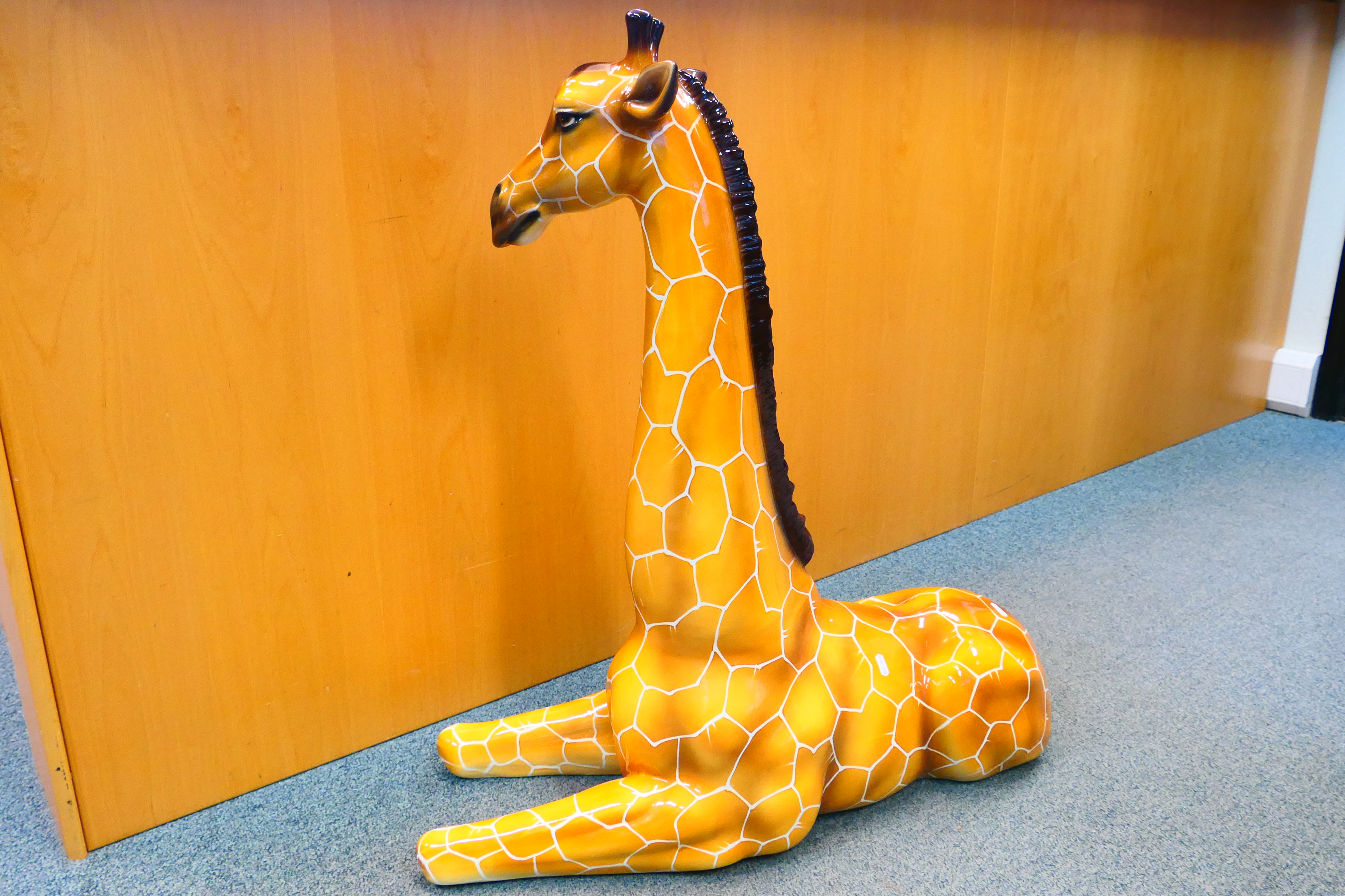 A large Italian ceramic study of a recumbent giraffe, approximately 90 cm (h). - Image 8 of 12