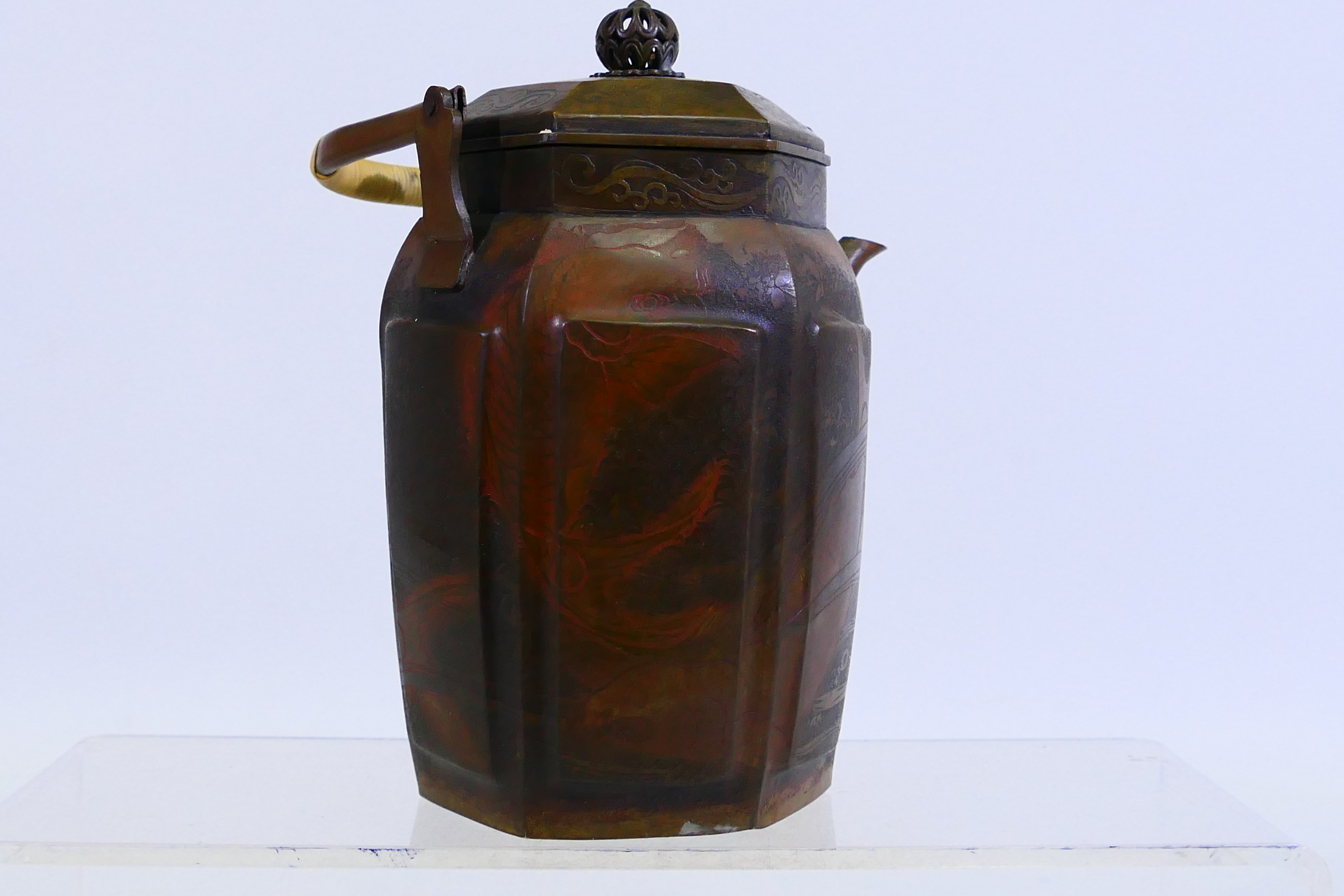 A hexagonal section metal teapot and cover with cane wrapped handle, 16 cm (h). - Image 3 of 8