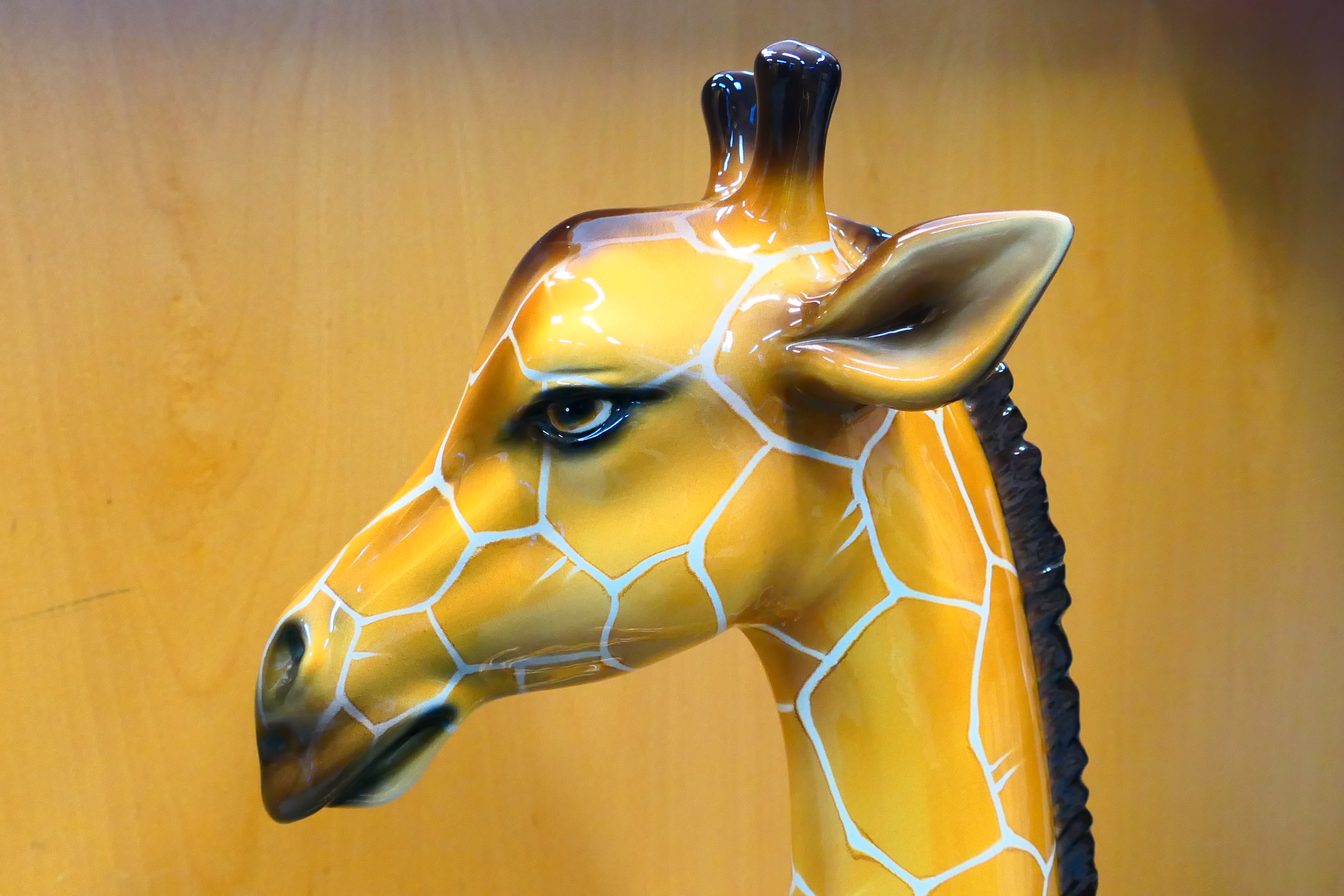 A large Italian ceramic study of a recumbent giraffe, approximately 90 cm (h). - Image 9 of 12