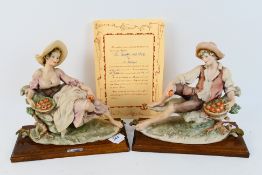 Guiseppe Armani (Capodimonte) - a pair of handcrafted sculptures depicting a 'Country Girl' and a