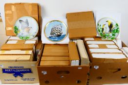 A quantity of collector plates contained in boxes / shipping packaging to include ships, birds,