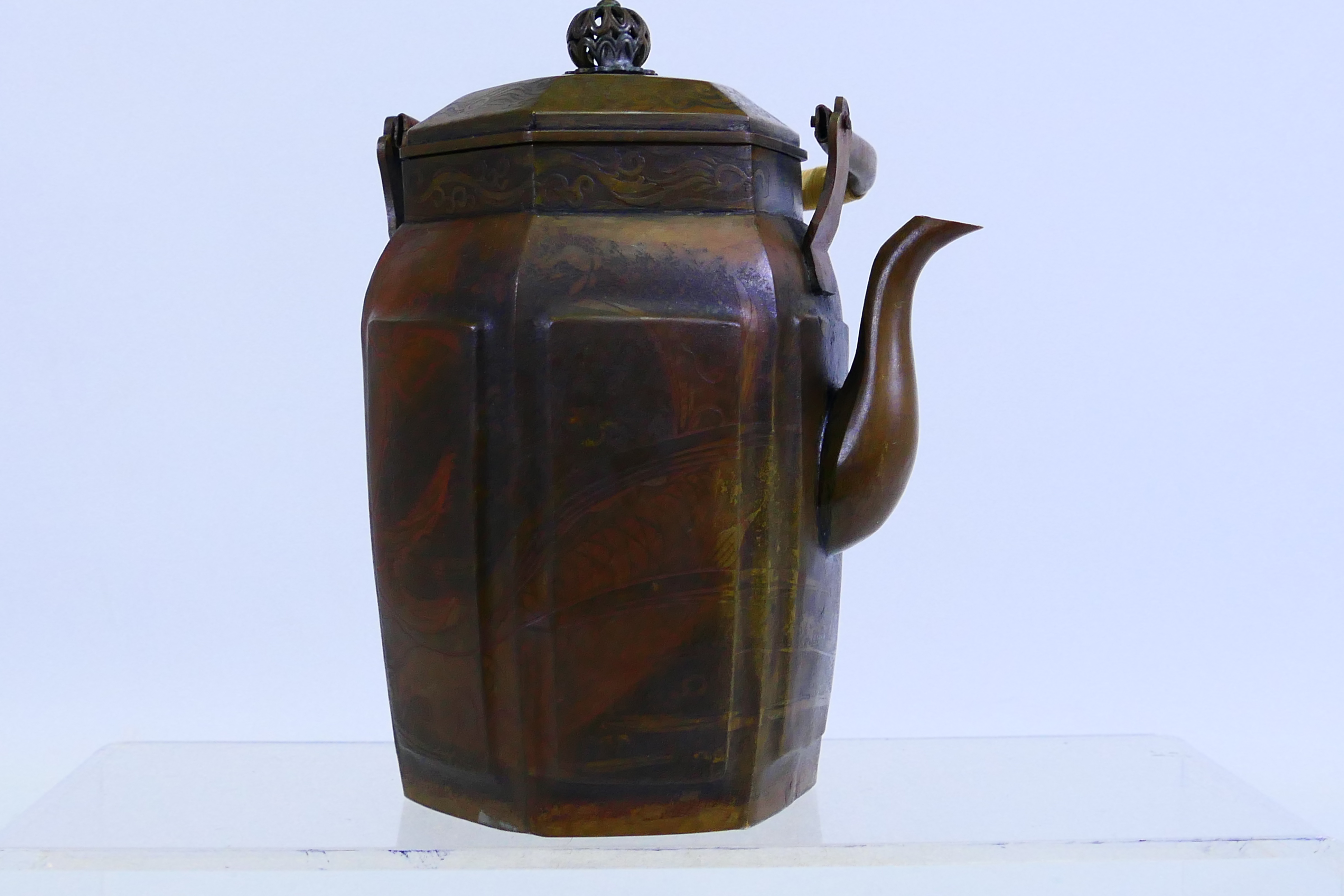 A hexagonal section metal teapot and cover with cane wrapped handle, 16 cm (h). - Image 2 of 8