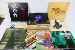 A collection of 12" vinyl records to include The Beatles 1967 - 1970 (blue vinyl version) PCSPB 718,