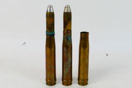 Two World War Two (WW2 / WWII) German 20mm shells and one case.