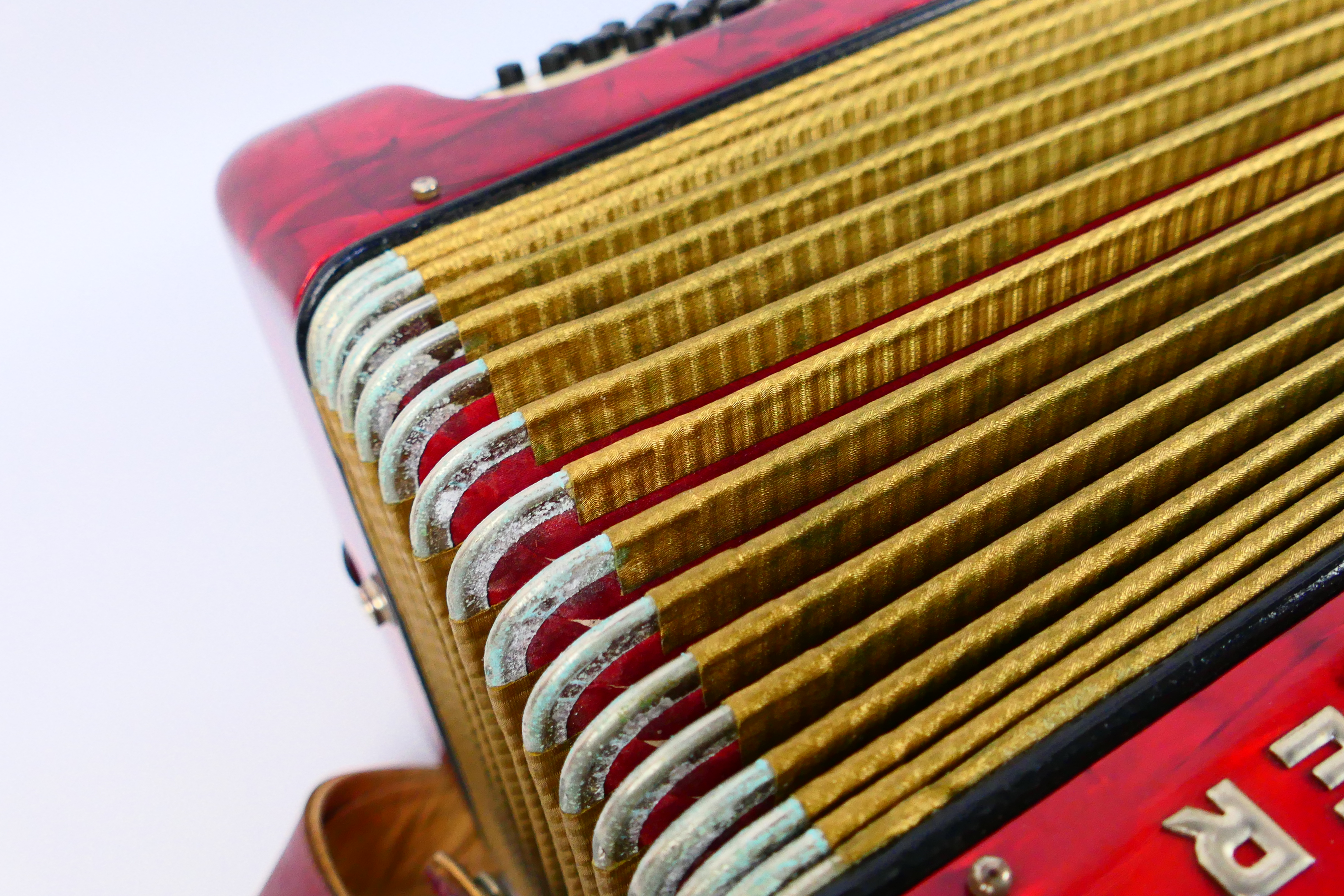 A vintage Hohner Verdi VM piano accordion, 41 keys and 120 basses, marbled red finish, - Image 16 of 18