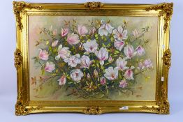 An oil on board floral study, titled Magnolia Soulangeana, signed by the artist Jean E Barker,