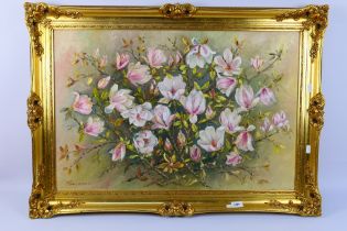 An oil on board floral study, titled Magnolia Soulangeana, signed by the artist Jean E Barker,