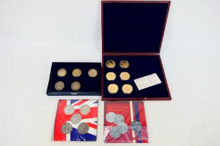 A Set of six gold plated coins,