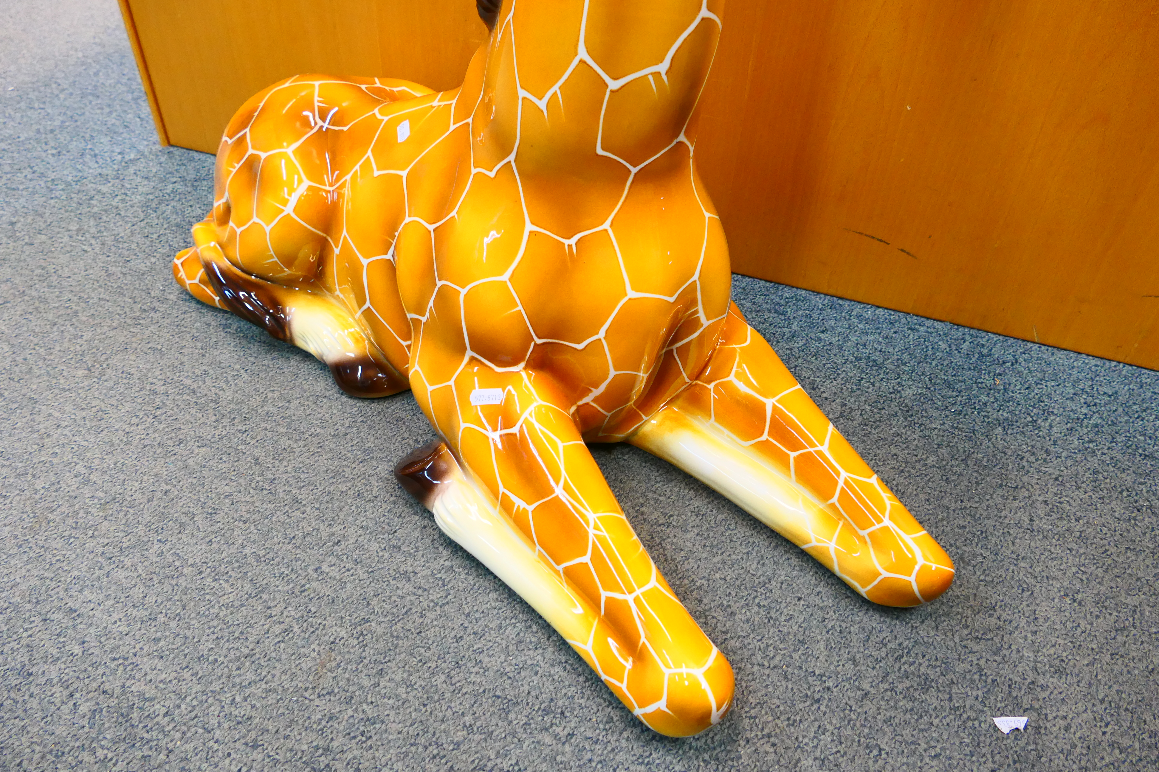 A large Italian ceramic study of a recumbent giraffe, approximately 90 cm (h). - Image 5 of 12