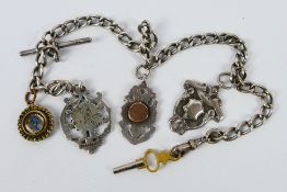 An antique silver pocket watch chain with T-bar,