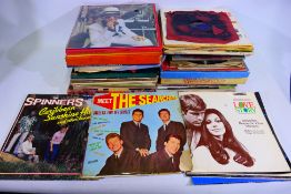 A collection of 12" and 10" vinyl records.