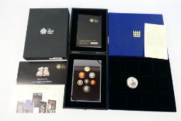 A Royal mint 2008 United Kingdom Proof Coin Collection and a 2006 1oz Silver Britannia coin. [2].