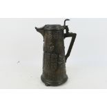 A large Kayserzinn pewter flagon of tapering form,