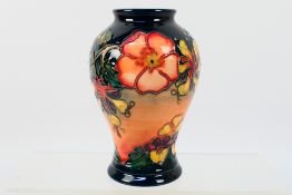 Moorcroft - A Moorcroft Pottery vase of inverted baluster form, 1994,