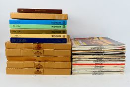 A collection of 12" vinyl records to include Frank Sinatra, Tony Bennett, Dave Brubeck,