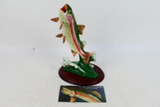 A Franklin Mint porcelain study of a rainbow trout entitled Defiance designed by Al Agnew,