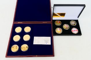 A Set of six gold plated coins,