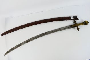 A late 19th century Piso Podang sword with single edged steel blade, 71 cm (l),