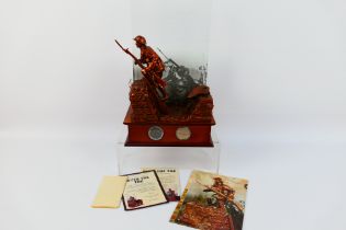 Danbury Mint - A bronzed sculpture Over The Top depicting a British soldier leaving the trench into