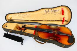 Violin - A Czechoslovakian Stradivarius copy, 60 cm (l), contained in case with bow.