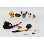 Lot to include a meerschaum style pipe, ceramic and metal animal figures,