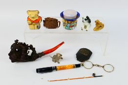 Lot to include a meerschaum style pipe, ceramic and metal animal figures,
