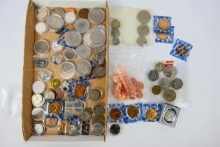 A collection of UK and US coins and tokens, some silver content noted.