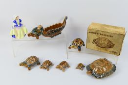 A boxed Wade Jumbo Tortoise, six smaller,